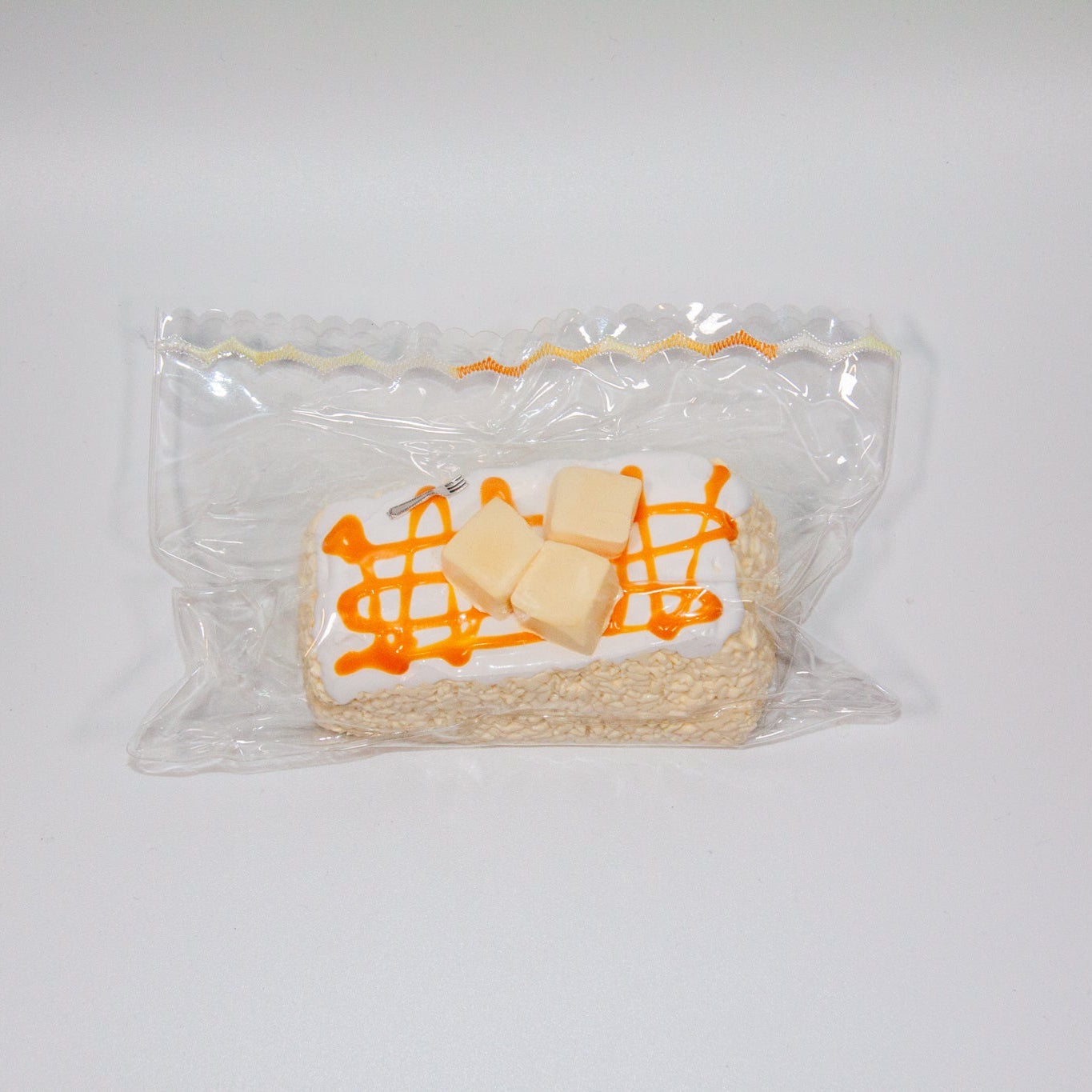 F48 Butter Cream Roll Taba Squishy