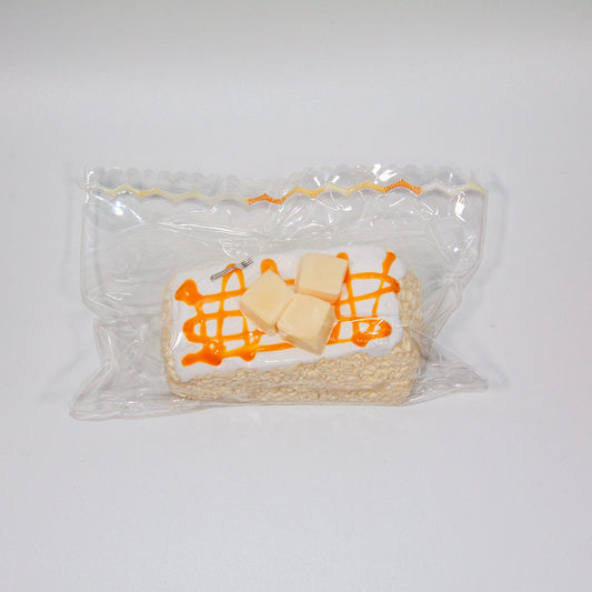 F48 Butter Cream Roll Taba Squishy